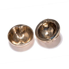 Tiny solid bronze box with lid resembling sails or Sydney opera house; inside view