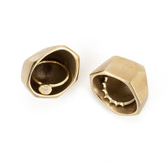 Set of two tiny facted bowls in polished bronze; shown on side holding a ring