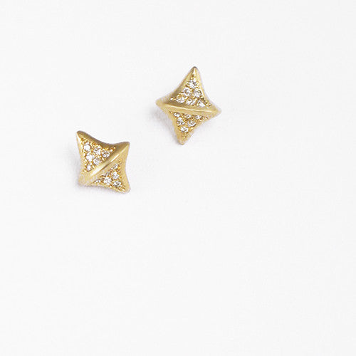 Diamond-shaped stud with raised center line; pavé diamonds on either side of center line; shown in yellow gold