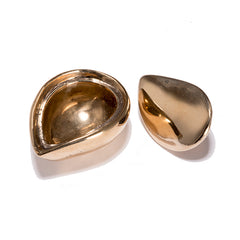 Small, leaf-shaped, cast bronze box; view of inside of box